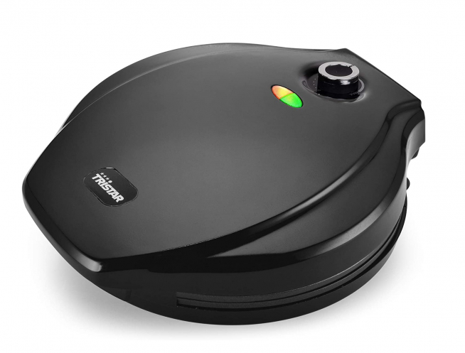 La máquina para hacer pizzas.