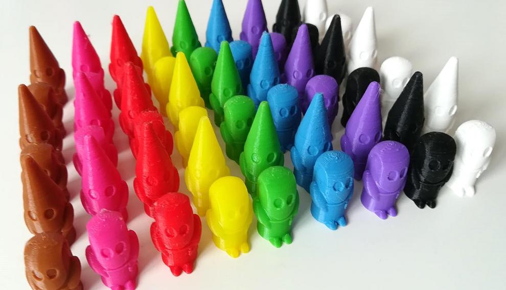 La pequeños cofrades que son las fichas del juego 'Procesión'.