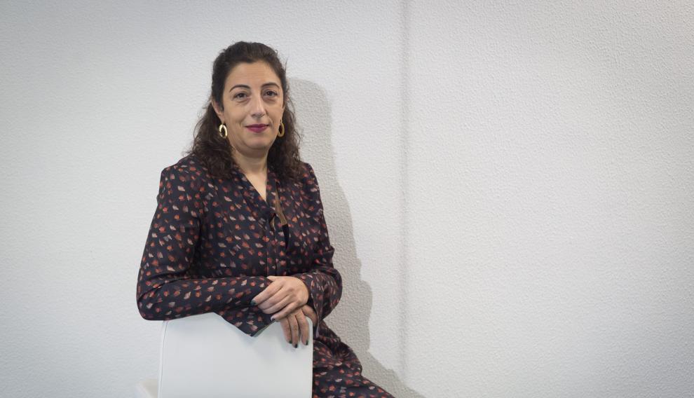 María Frisa.