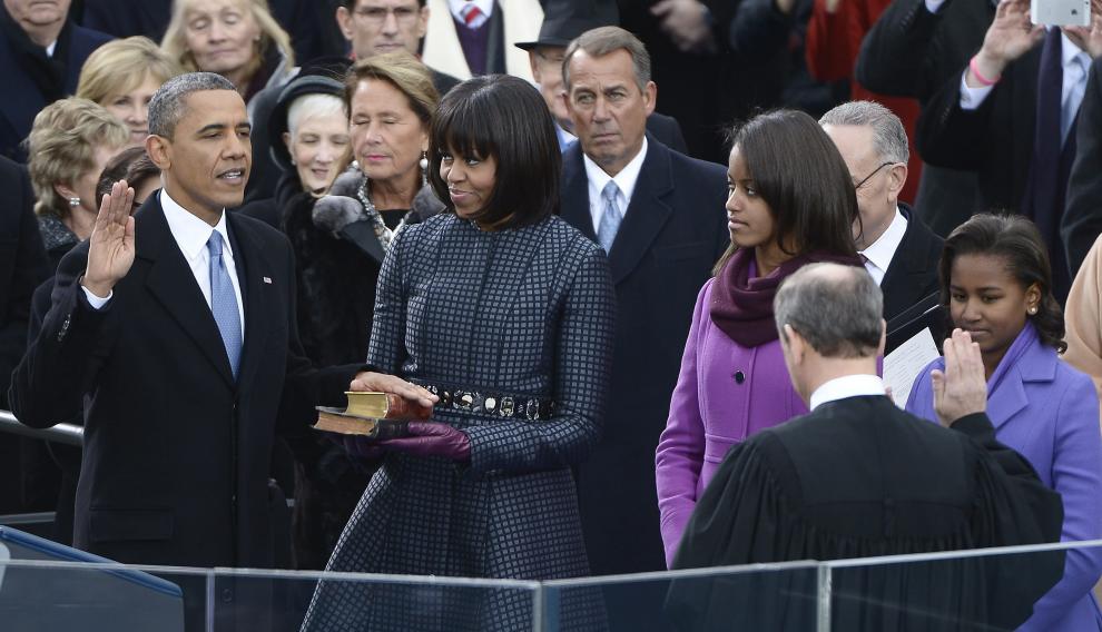 Michelle Obama, con un abrigo de Thom Browne, en la toma de posesión de su marido como presidente de los Estados Unidos en 2013