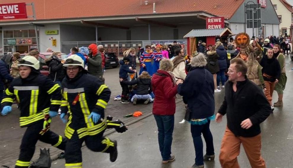 People react at the scene after a car ploughed into a carnival parade injuring several people in Volkmarsen