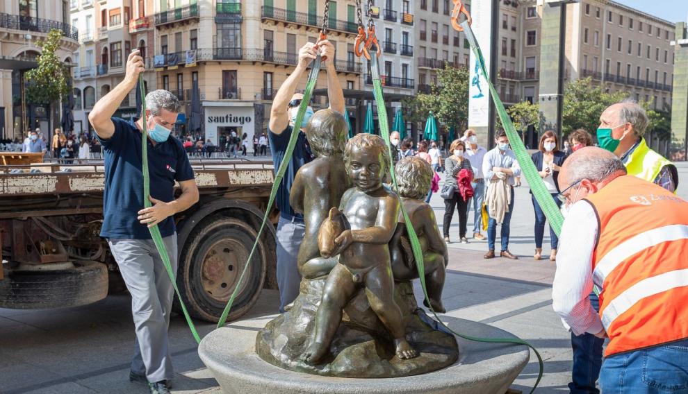 Fuentes de los niños con peces