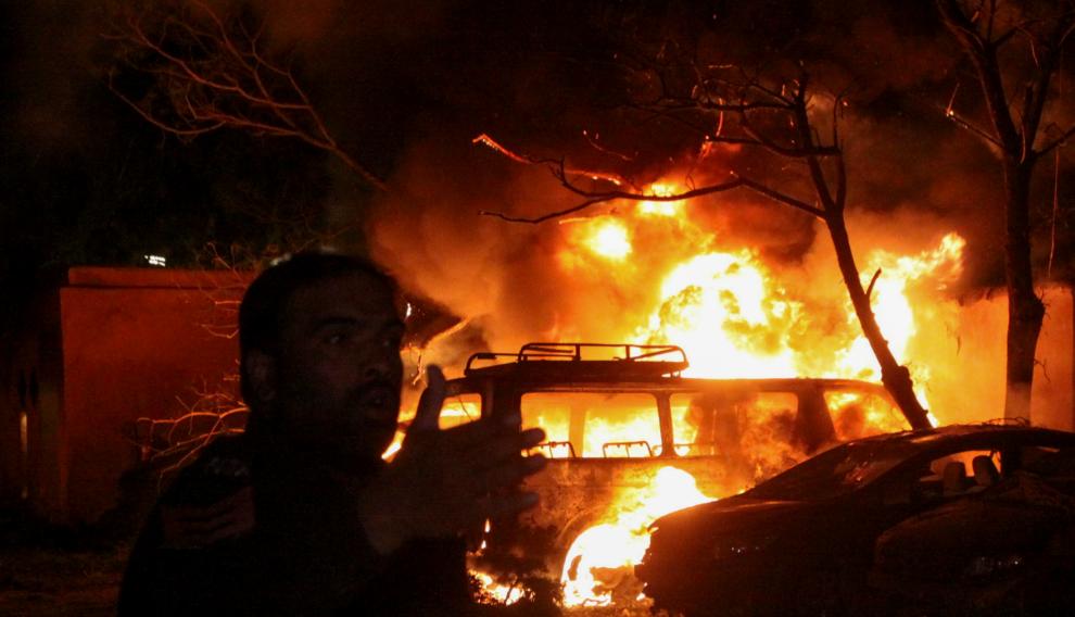 A police officer reacts after an explosion at a luxury hotel in Quetta