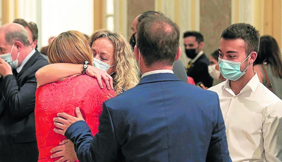 La ministra, con sus hermanos y su sobrino.