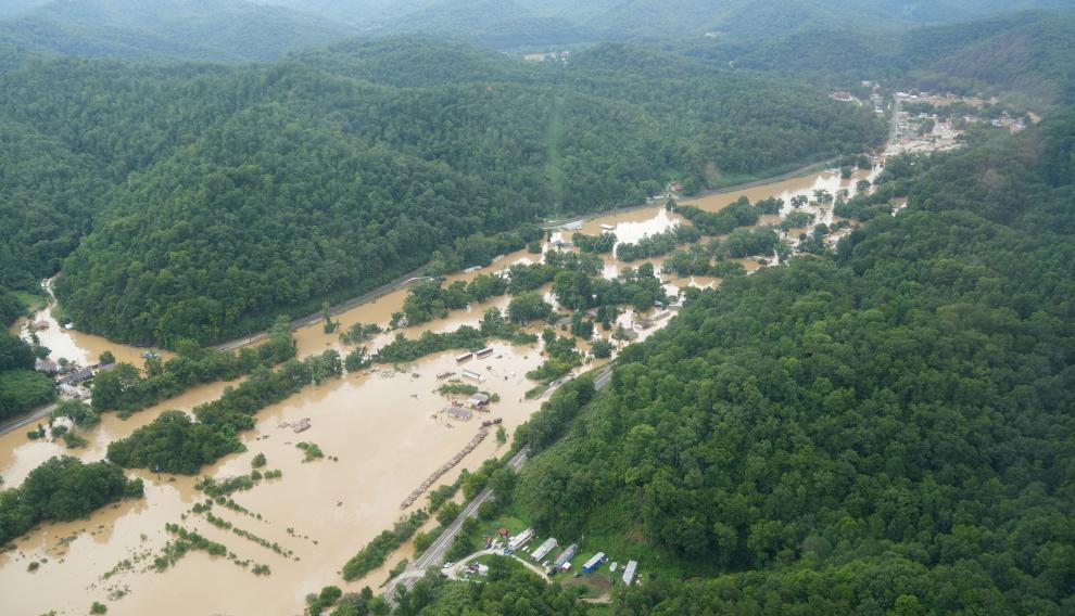 A valley lies flooded as seen from a helicopter during a tour by Kentucky Governor Andy Beshear