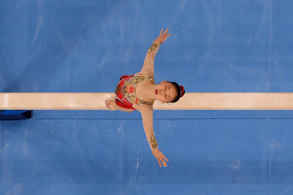 Tokyo 2020 Olympics - Gymnastics - Artistic - Womens Beam - Final - Ariake Gymnastics Centre, Tokyo, Japan - August 3, 2021. Guan Chenchen of China in action. REUTERS/Athit Perawongmetha[[[REUTERS VOCENTO]]] OLYMPICS-2020-GAR/W-1APBB-FNL