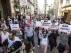 Los manifestantes, en la calle de Alfonso I, portando carteles con los nombres de municipios turolenses.