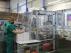 Tramo final de la línea de producción de jeringuillas para vacunas en la planta de Becton en Fraga.
