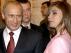 Foto de archivo de Vladimir Putin y Alina Kabaeva. FILE PHOTO: Russian President Vladimir Putin (L) smiles next to Russian gymnast Alina Kabaeva during a meeting with the Russian Olympic team at the Kremlin in Moscow, Russia in this November 4, 2004 file photo. REUTERS/ITAR-TASS/PRESIDENTIAL PRESS SERVICE/File Photo UKRAINE-CRISIS/USA-SANCTIONS