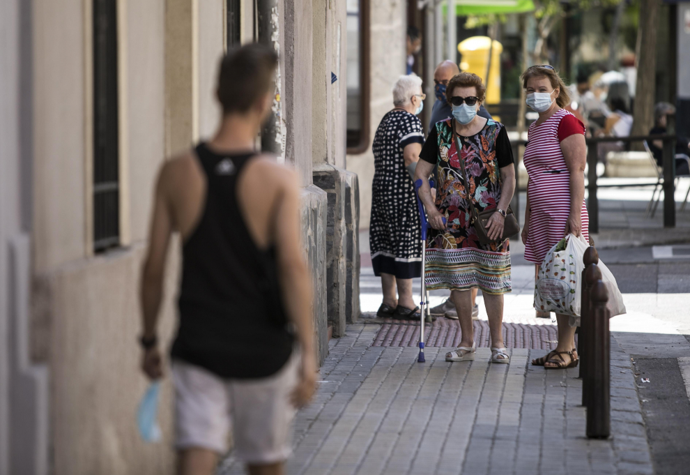 Imágenes de Las Delicias, el barrio de Zaragoza más afectado por el coronavirus.