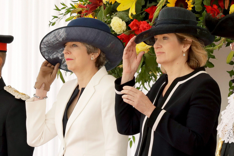 La primera ministra británica, Theresa May y la secretaria de Estado de Interior, Amber Rud.