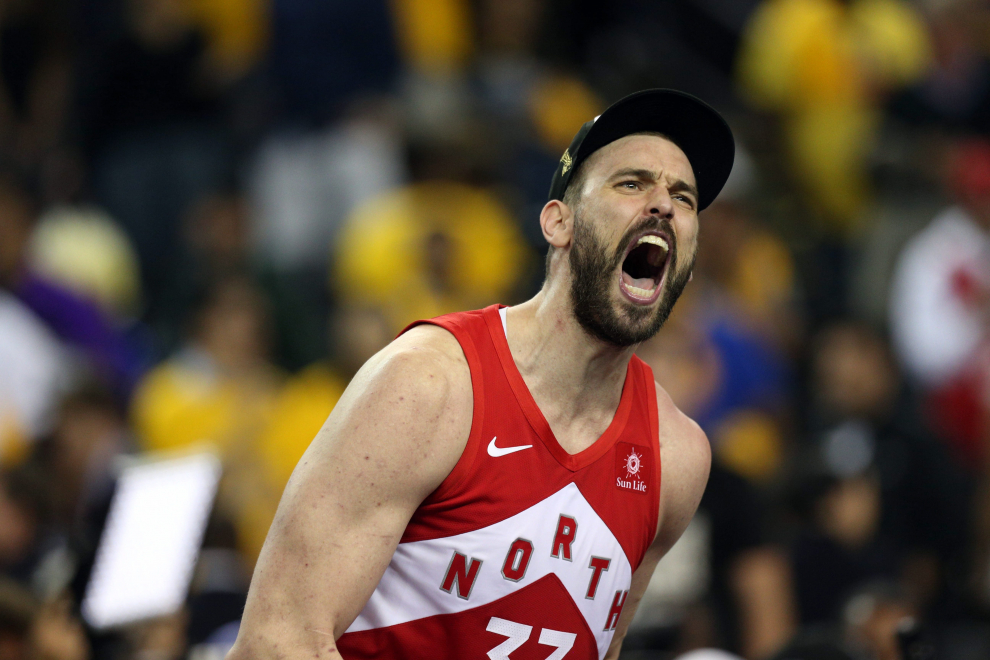 Jun 13, 2019; Oakland, CA, USA; Toronto Raptors center Marc Gasol (33) and Toronto Raptors center Serge Ibaka (9) celebrate winning the NBA Championship over the Golden State Warriors against game six of the 2019 NBA Finals at Oracle Arena. Mandatory Credit: Sergio Estrada-USA TODAY Sports [[[REUTERS VOCENTO]]] BASKETBALL-NBA-GSW-TOR/