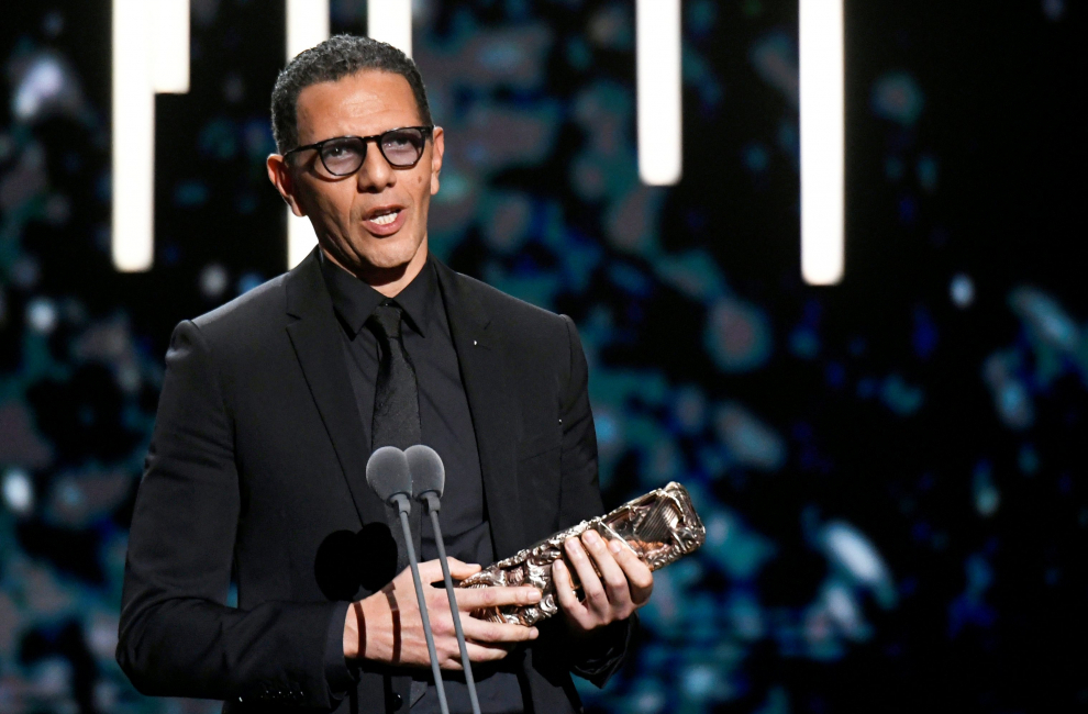 Swann Arlaud accepts the Best Male Supporting Award for the film "Grace a dieu" during the 45th Cesar Awards ceremony in Paris, France, February 28, 2020. REUTERS/Piroschka van de Wouw [[[REUTERS VOCENTO]]] AWARDS-CESARS/