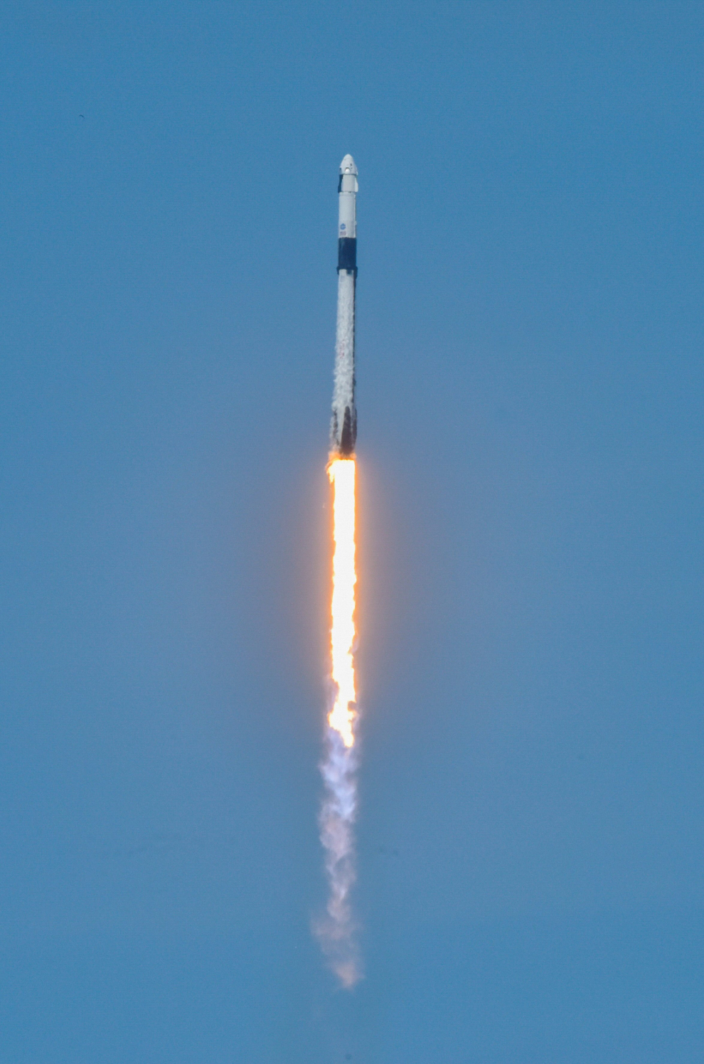 A SpaceX Falcon 9 rocket and Crew Dragon spacecraft carrying NASA astronauts Douglas Hurley and Robert Behnken lifts off during NASA's SpaceX Demo-2 mission to the International Space Station from NASA's Kennedy Space Center in Cape Canaveral