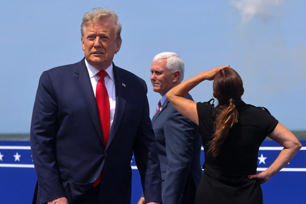 U.S. President Donald Trump, U.S. Vice President Mike Pence and his wife Karen Pence watch the launch of a SpaceX Falcon 9 rocket and Crew Dragon spacecraft, from Cape Canaveral