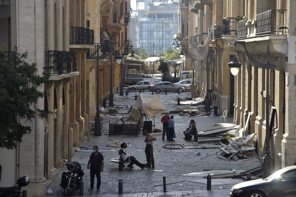 A woman sweeps at a damaged hospital following Tuesday's blast, in Beirut Lebanon August 5, 2020. REUTERS/Mohamed Azakir [[[REUTERS VOCENTO]]] LEBANON-SECURITY/BLAST