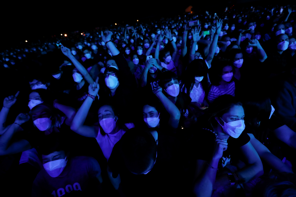 People wearing protective masks attend a concert of Love HEALTH-CORONAVIRUS/SPAIN- CONCERT
