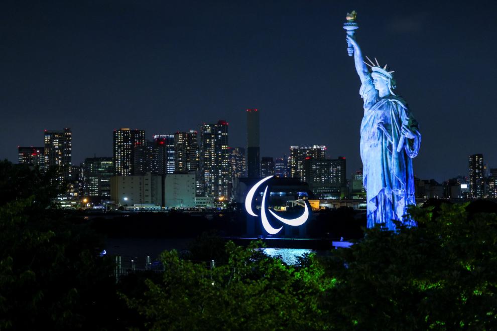 The Paralympic symbol is illuminated at the waterfront area of Odaiba Marine Park, ahead of the opening ceremony of the Tokyo 2020 Paralympic Games, in Tokyo, Japan August 23, 2021 REUTERS/Athit Perawongmetha[[[REUTERS VOCENTO]]] PARALYMPICS-2020/
