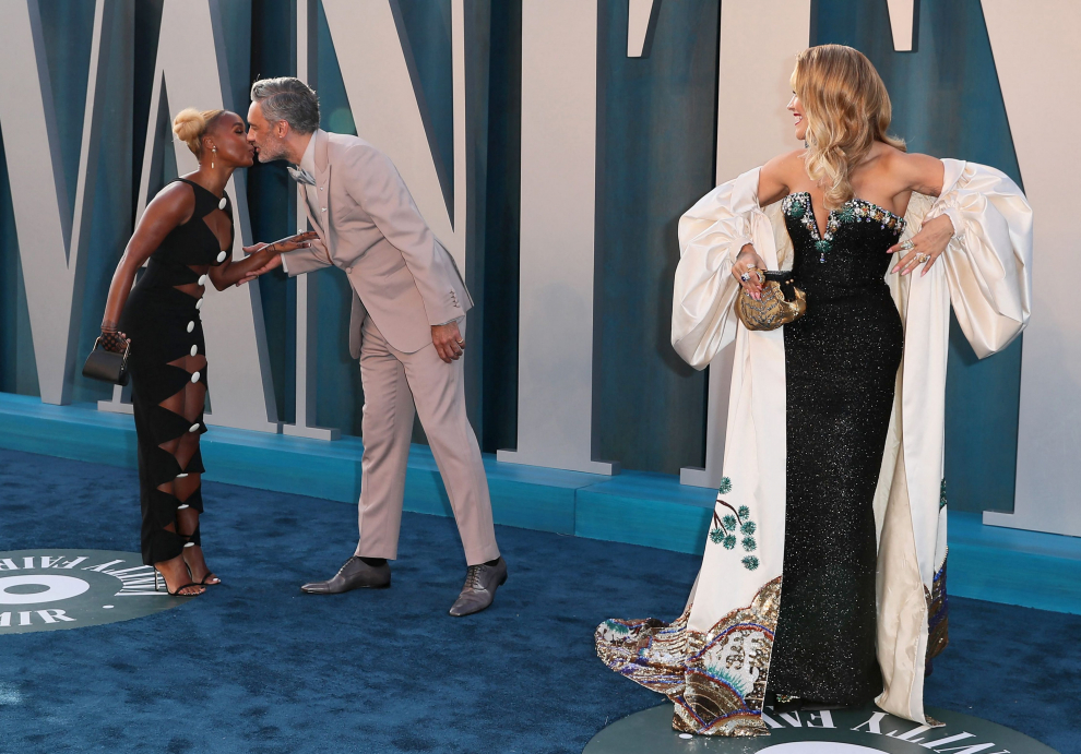 Jason Blum and Lauren Schuker arrive at the Vanity Fair Oscar party during the 94th Academy Awards in Beverly Hills, California, U.S., March 27, 2022.   REUTERS/Danny Moloshok AWARDS-OSCARS/VANITYFAIR-ARRIVALS