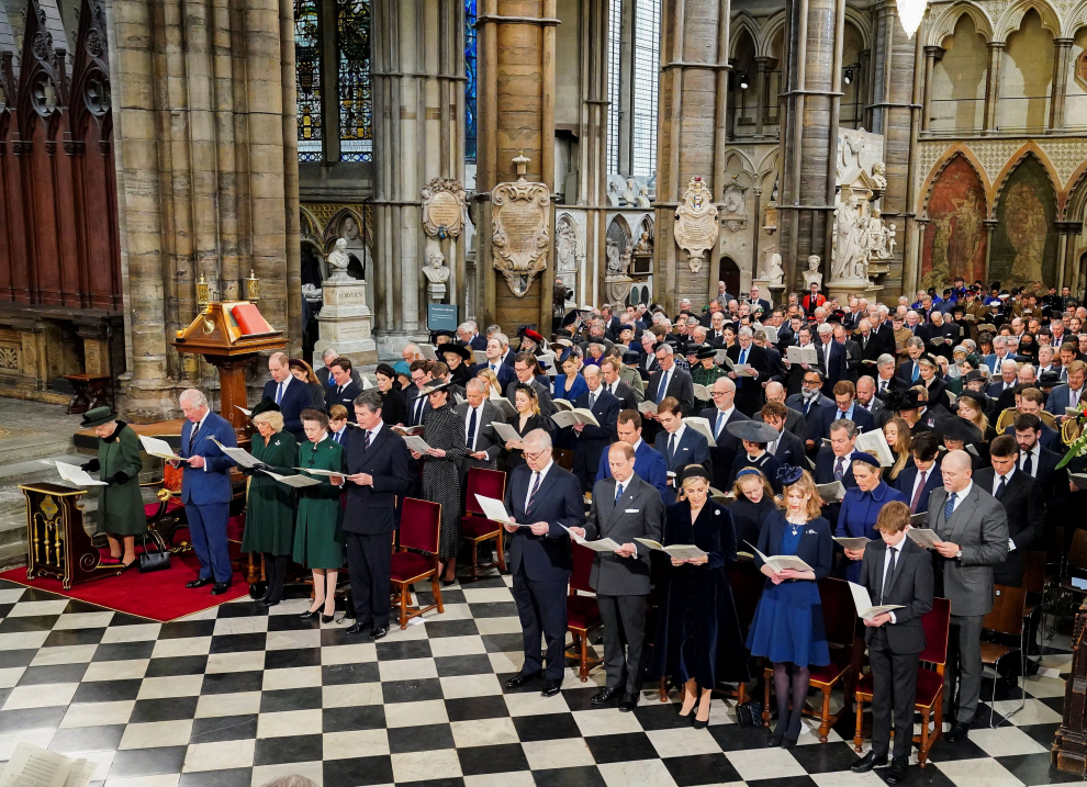 Britain's Queen Elizabeth, Prince Charles, Camilla Duchess of Cornwall, Anne Princess Royal, Vice Admiral Sir Timothy Laurence, Prince Andrew Duke of York, Prince Edward, Earl of Wessex, his wife Sophie, Countess of Wessex, Catherine, Duchess of Cambridge, Prince George, Princess Charlotte, Peter Phillips and Isla Phillips attend a service of thanksgiving for late Prince Philip, Duke of Edinburgh, at Westminster Abbey in London, Britain, March 29, 2022. Dominic Lipinski/Pool via REUTERS BRITAIN-ROYALS/PHILIP-MEMORIAL
