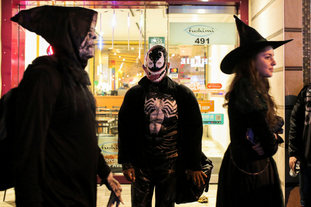 Aaron, dressed as The Terrifier, attends Church Street's annual Halloween party in Toronto, Ontario, Canada October 31, 2022. REUTERS/Nick Lachance HALLOWEEN-DAY/CANADA