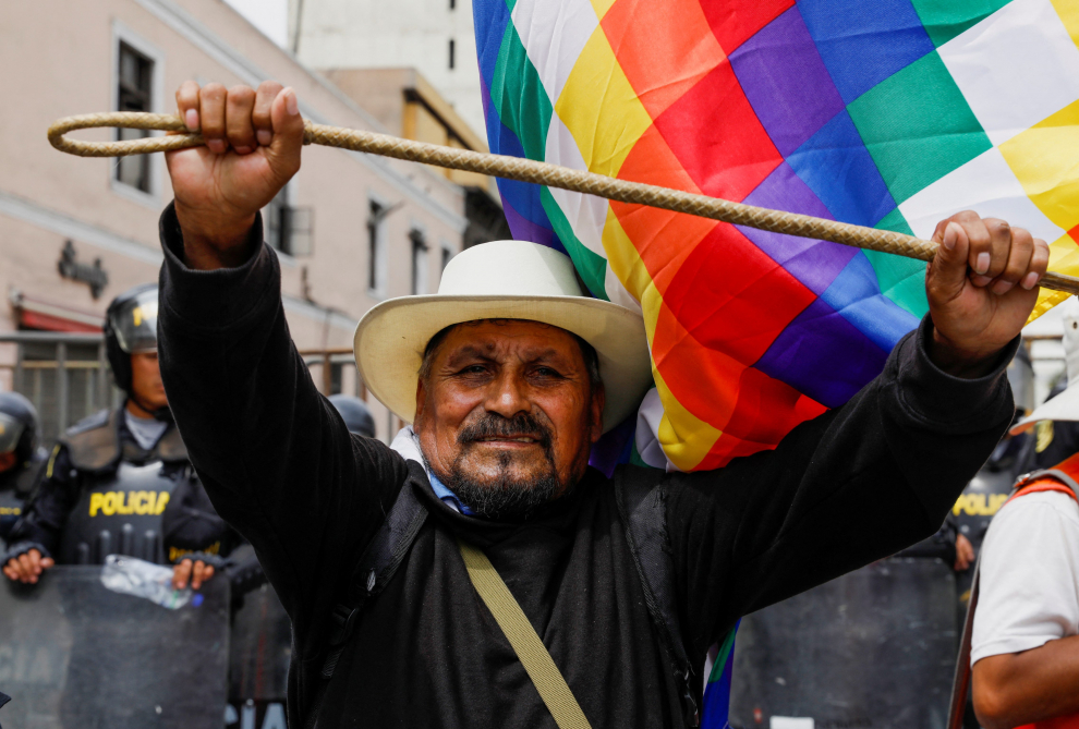 A supporter of Peru's President Pedro Castillo uses a megaphone during a protest after the Congress approved the removal of President Pedro Castillo, in Lima, Peru, December 7, 2022. REUTERS/Alessandro Cinque PERU-POLITICS/CASTILLO