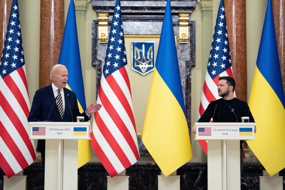 U.S. President Joe Biden delivers a statement as Ukrainian President Volodymyr Zelenskiy listens to him at Mariinsky Palace during an unannounced visit, in Kyiv, Ukraine, Monday, Feb. 20, 2023. Evan Vucci/Pool via REUTERS UKRAINE-CRISIS/BIDEN