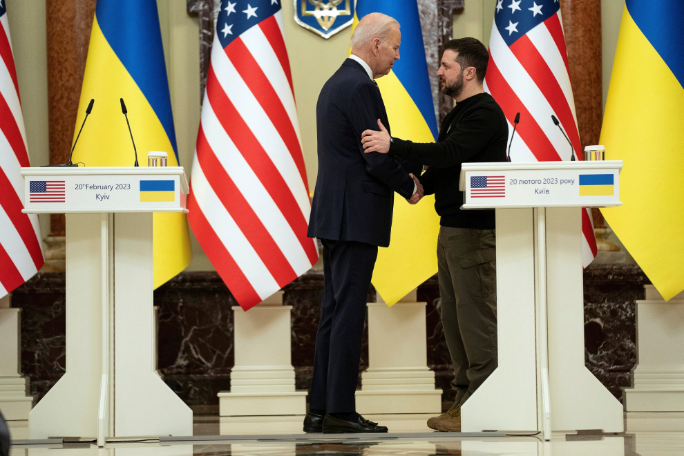U.S. President Joe Biden and Ukrainian President Volodymyr Zelenskiy arrive to deliver statements at Mariinsky Palace during an unannounced visit, in Kyiv, Ukraine, Monday, Feb. 20, 2023. Evan Vucci/Pool via REUTERS UKRAINE-CRISIS/BIDEN