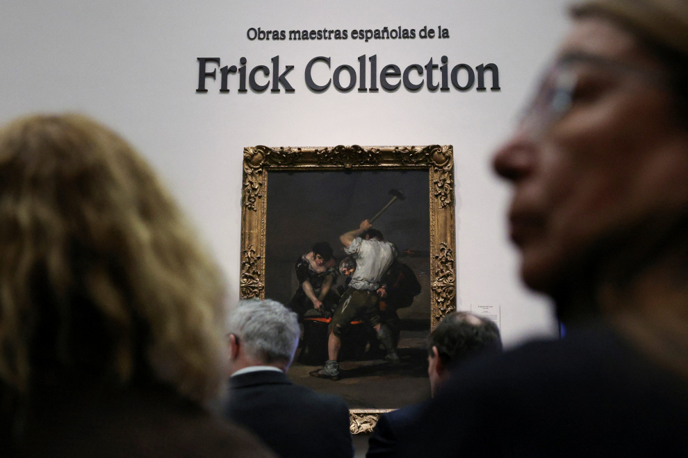 A visitor attends the opening of an exhibit with paintings, some never seen in contemporary Spain, by Spanish authors Velazquez, Goya, Murillo and El Greco, borrowed for a temporary exhibition at Madrid's El Prado after the museum reached an agreement with New York's Frick Collection, in Madrid, Spain, March 6, 2023. REUTERS/Violeta Santos Moura SPAIN-ART/FRICK