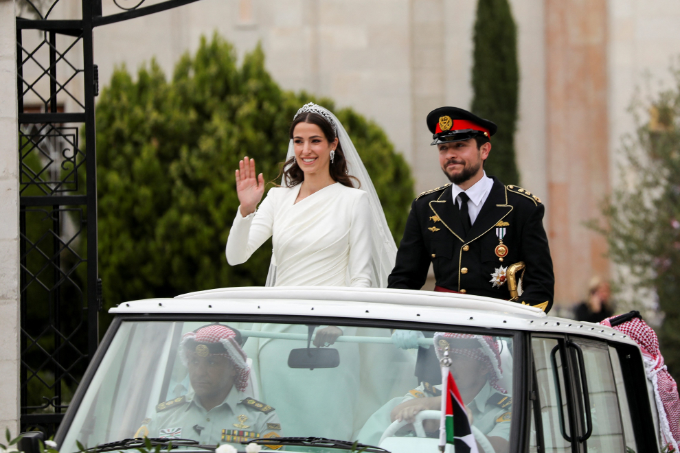 Jordan's Crown Prince Hussein and Rajwa Al Saif are seen together at their royal wedding ceremony, in Amman, Jordan, June 1, 2023 in this screen grab taken from a video. Royal Hashemite Court (RHC)/Handout via REUTERS ATTENTION EDITORS - THIS IMAGE WAS PROVIDED BY A THIRD PARTY. NO RESALES. NO ARCHIVES. TPX IMAGES OF THE DAY JORDAN-ROYALS/WEDDING
