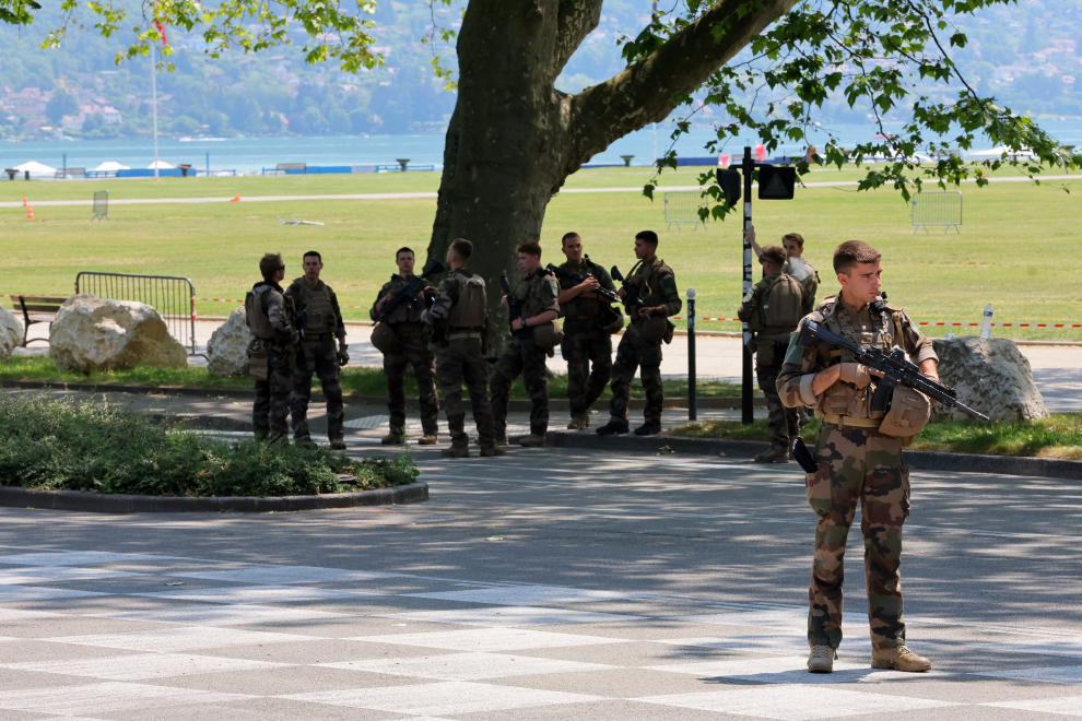 French police and soldiers secure the area after several children and an adult have been injured in a knife attack in Annecy, in the French Alps, France, June 8, 2023. REUTERS/Denis Balibouse FRANCE-SECURITY/