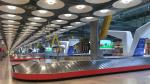 Empty baggage carousels are seen at Madrid's Adolfo Suarez Barajas Airport