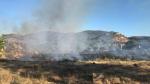 Incendio en el paraje de Val de Zail, junto al río Guadalope, en Caspe.