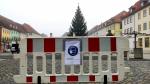 Una señal recuerda el uso de mascarillas en un mercadillo navideño de Hildburghausen.