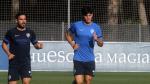 Cristian Salvador, junto al readaptador Jorge Carracedo, durante el entrenamiento de este lunes.