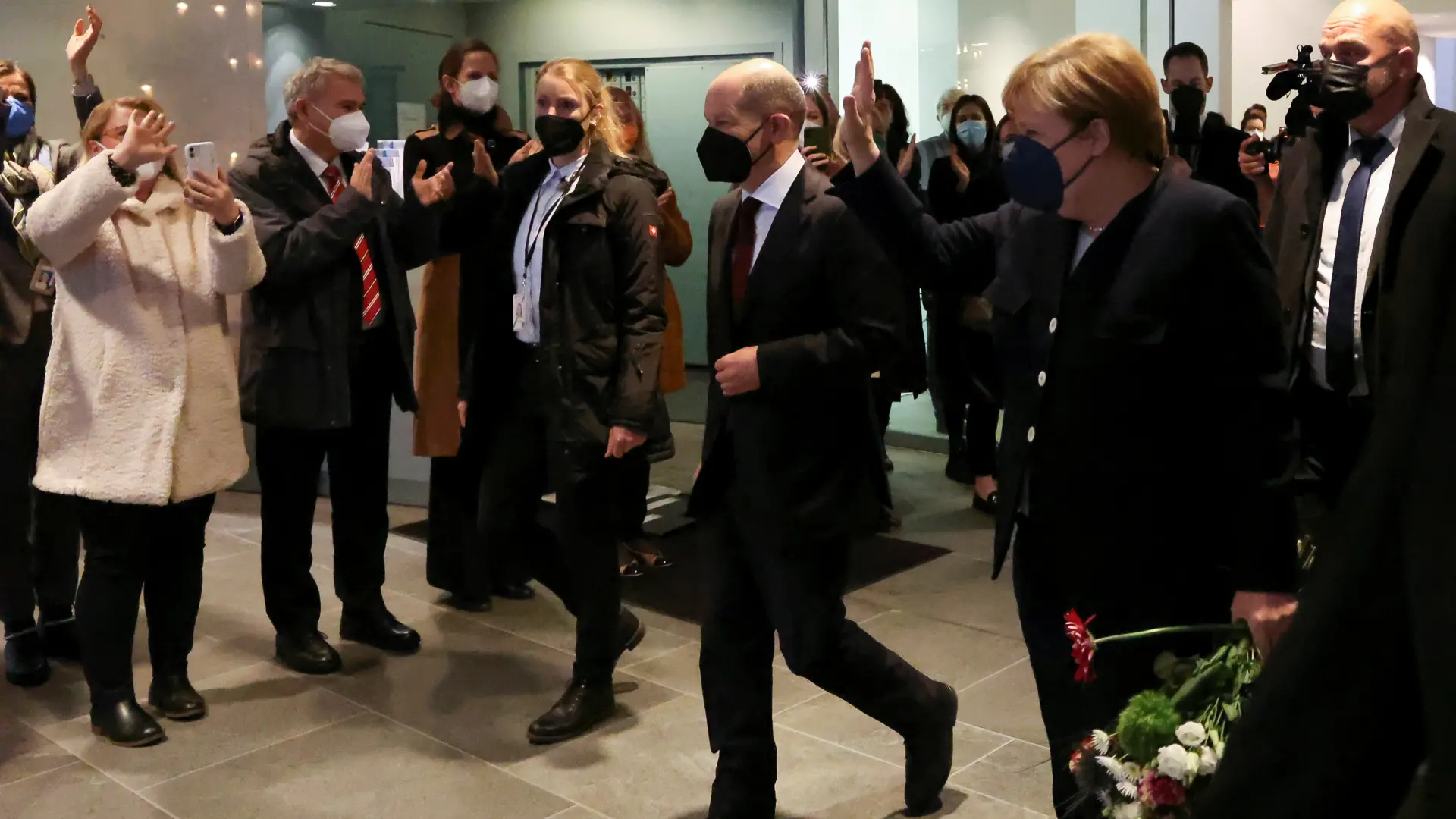 Former German Chancellor Merkel bids farewell to her successor Scholz in Berlin