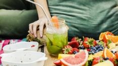 Woman drinking a fresh Mojito