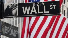 The Wall Street sign is pictured at the New York Stock exchange (NYSE) in the Manhattan borough of New York City