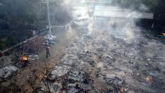 Restos de la incineración masiva de fallecidos por covid en Nueva Delhi.