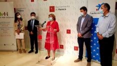 El acto de renovación de 'Huesca más inclusiva' celebrado en el Ayuntamiento.
