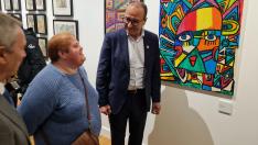 El consejero Felipe Faci ha inaugurado esta exposición, con la que culmina el 60 aniversario de Atades