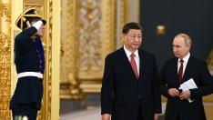 El líder chino, Xi Jinping, junto a su homólogo ruso, Vladímir Putin