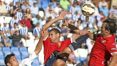 Los zaragocistas Diogo y Adán Pérez, durante el partido de ayer en Huelva.