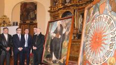 Pozuelo recupera el lienzo de San Antón y exhibe el Reloj Gótico aparecido bajo la pintura