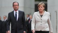 Merkel y Hollande reclaman más fondos y más compromisos ante el cambio climático