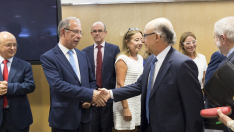 El consejero Gimeno y el ministro Montoro, en el Consejo de Política Fiscal que se celebró en julio.