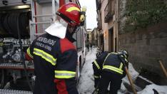 Los bomberos en sus labores tras la fuerte granizada caída este lunes  en Ágreda que ha asolado cultivos del término municipal