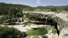 El paraje de 'El Salto', cascada formada por el río Tastavins en el término municipal de La Portellada.