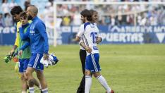 Natxo González se abraza con Buff a la conclusión del encuentro.