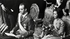 (FILES) -- A file photo taken in February 1976 shows King Juan Carlos of Spain and his wife Queen Sophia of Greece, playing with their children Crown Prince Felipe, 8, and daughter Elena, 12, in Zarzuela Palace in Madrid. Spanish King Juan Carlos will abdicate in favour of his son Prince Felipe, the nation announced on June 2, 2014, ending a 39-year reign that ushered in democracy but was was later battered by royal scandals. The 76-year-old monarch, crowned in November 1975 after the death of General Francisco Franco, is stepping down dogged by health woes and with his popularity deeply eroded by scandals swirling around him and his family. AFP PHOTO SPAIN-ROYALS-ABDICATE-POLITICS-FILES